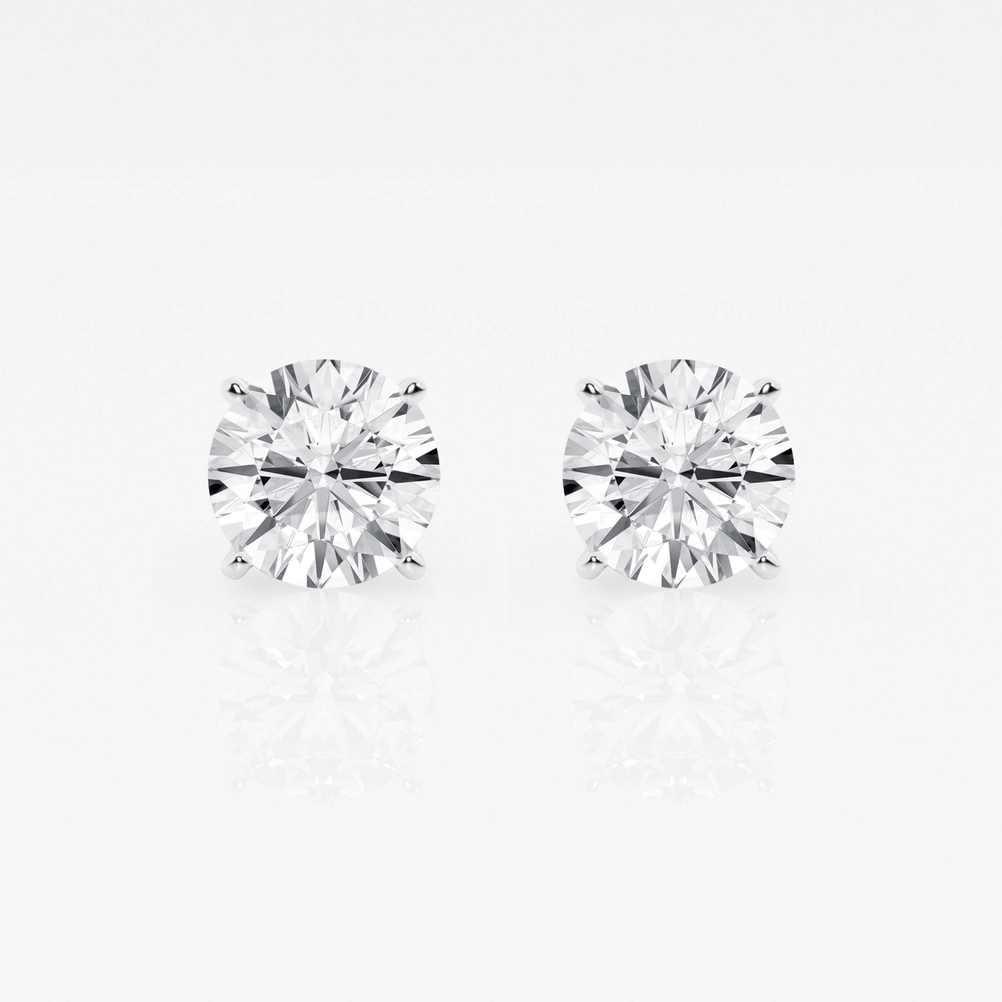 White Gold Diamond Studs - Four Prong Basket